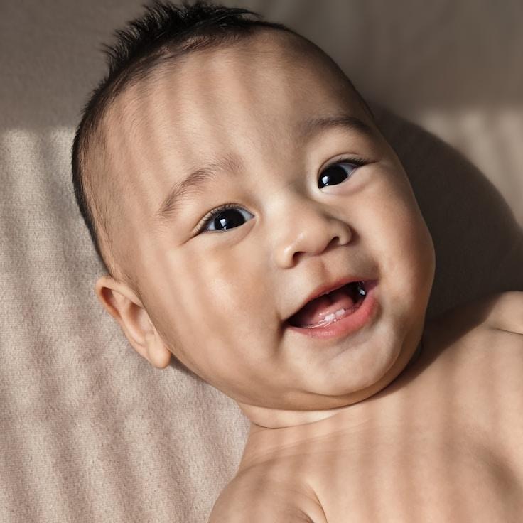 Kaveri Mehta, Lead Design Curator at Pacific Sky Gateway, reviewing corporate floral arrangements